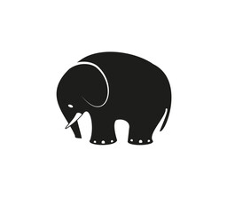 Black silhouette of an elephant standing on a white background showcasing its distinctive features and form