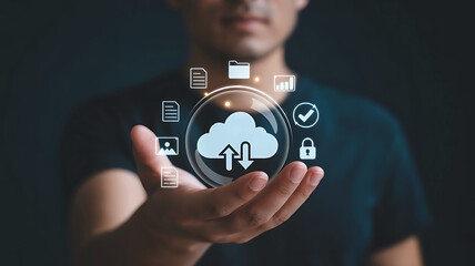 Man holding a holographic cloud icon with upload and download arrows surrounded by digital data icons representing cloud computing technology