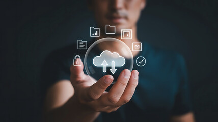 Man holding a crystal ball with cloud computing icons and digital data symbols floating around it