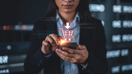 Woman using smartphone with glowing shopping cart icon and arrow for online shopping and e commerce concept