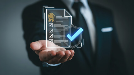 Businessman holding a holographic document with a verified checkmark signifying approval and successful completion of tasks
