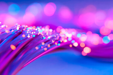 A futuristic abstract digital representation of data packets flowing through a fiber optic cable in brilliant blue