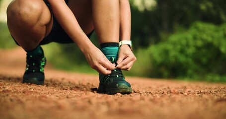 Nature, fitness and woman tie shoes ready to start workout, exercise and training for hike outdoor. Sports, sneakers and hands of person with shoelace for wellness, health and adventure on trail - Powered by Adobe