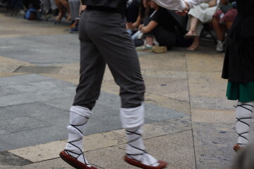 Basque folk dance performance in an outdoor festival