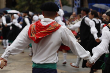 Basque folk dance performance in an outdoor festival