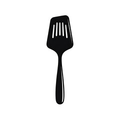 A simple spatula, angled slightly, against a black background