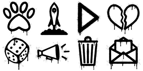 Urban graffiti stencil designs in black spray paint featuring a paw print, rocket launch, play button, broken heart, dice, megaphone, trash can, and envelope.