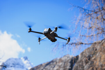 Flying drone in high altitude mountains