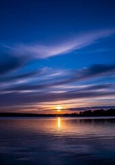 Fototapeta premium Mesmerizing twilight seascape with layered clouds reflecting warmth