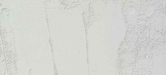 plaster texture looking background on concrete wall