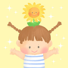 大きなひまわりを頭に乗せた笑顔の女の子 子供