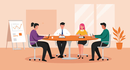Meeting of 4 people at a round table with paperwork and laptops