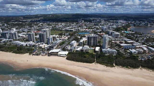 Beachside Hotel And Apartment Buildings At Maroochydore Beach In Queensland, Australia. Aerial Pullback Shot
