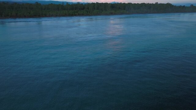 Cape Wom Meri beach Dogreto Bay Madang Wewak Harbor View Papua New Guinea aerial drone Kavieng Vanimo Tufi coastline early morning sunrise untouched morning remote tropical shore waves forward pan up