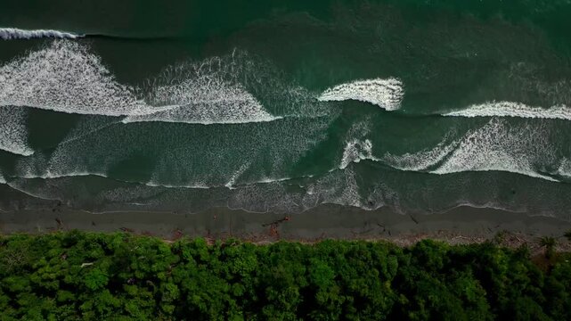Remote untouched pristine tropical shore wave swell Cape Wom Public Beach Dogreto Bay Madang Wewak harbor view Papua New Guinea aerial drone Kavieng Vanimo Tufi island coastline sunny right motion