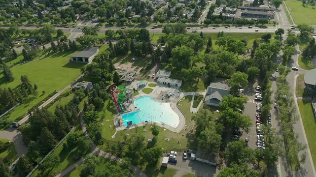 Aerial Orbit Henderson Pool in Lethbridge, Alberta - Sunny Summer Day