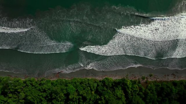 Remote untouched pristine tropical shore wave swell Cape Wom Public Beach Dogreto Bay Madang Wewak harbor view Papua New Guinea aerial drone Kavieng Vanimo Tufi island coastline sunny left motion