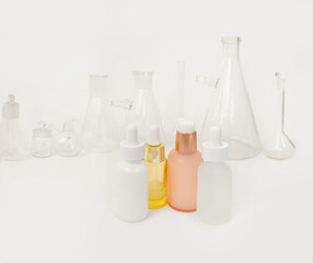 skin serum, moisturizing and whitening serum, fruit acids.Glass Volumetric Flask  ,Laboratory Flasksare used for  laboratory work  in the background