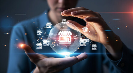 Hands holding glowing crystal ball displaying digital icons for business finance and real estate concepts