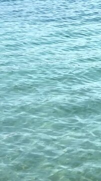 Top view of sea little waves pattern and crystal clear water. Armenia, Sevan. High quality