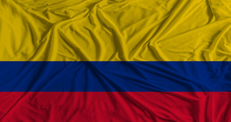 Obraz premium Colombia flag with fabric texture background. National flag of Colombia with cloth texture