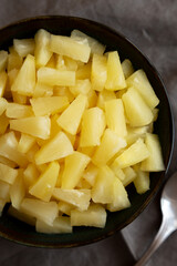 Canned Pineapple Tidbit Chunks in a Bowl, top view.