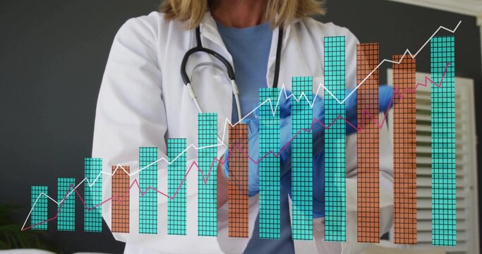 Analyzing patient data doctor wearing lab coat viewing floating charts in clinic with blue gloves