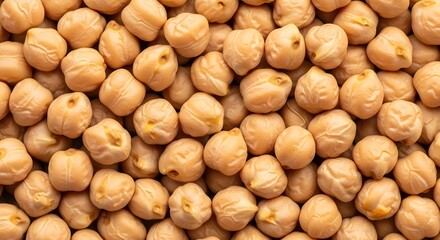 Premium organic chickpeas, healthy legume ingredient for delicious vegetarian and vegan recipes, natural food texture background