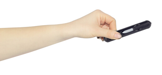 multitool for cleaning headphones in hand, outstretched hand with multitool for cleaning headphones isolated on background