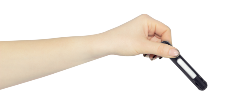 multitool for cleaning headphones in hand, outstretched hand with multitool for cleaning headphones isolated on background