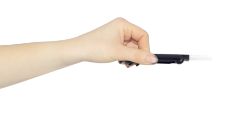 multitool for cleaning headphones in hand, outstretched hand with multitool for cleaning headphones isolated on background