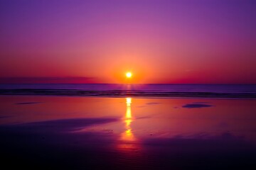 Obraz premium Beautiful tropical beach sunrise with purple and orange sky, calm ocean waves, golden horizon, sandy shore, and tranquil atmosphere. Perfect serene seascape for travel, vacation, and nature background