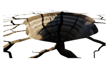 Aerial view of a large circular pit with layered earth and some visible cracks in the ground area