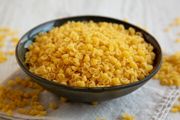 Homemade Perlini Pasta in a Bowl, side view. Close-up.