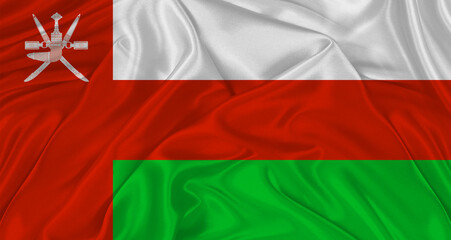 Flag of Oman with cloth texture. Close up of Oman flag waving