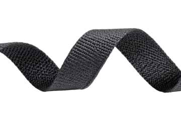 Dark gray woven ribbon in a curved, flowing form