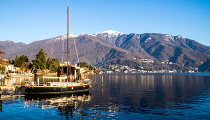 Scenic lake view with sailboat