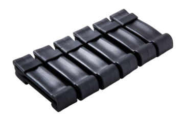 Black polymer conveyor belt sections.  Stacked, flat.  Industrial component