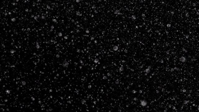 Loop grey circle particles cloud animation motion on black abstract Background. Gold blue stars particle on black background motion titles cinematic