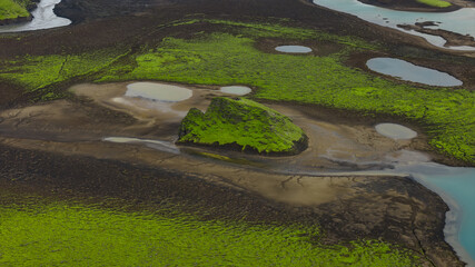 Aerial View of Moss Covered Hill and Volcanic Landscape in Iceland