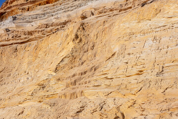 Sand erosion cascading on cliff in Almonte Donana National Park Andalusia Spain. 2 september 2025.