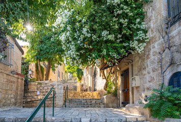 Fototapeta premium Historic street in the Mishkenot Sha'ananim(Yemin Moshe) neighborhood in Jerusalem
