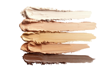 Cosmetic foundation swatches in various shades.  A top-down view shows several swaths of foundation, ranging from light beige to deep brown.  The textures are smooth and creamy