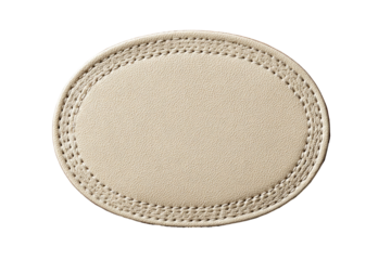 Cream-colored oval leather coaster, stitched border