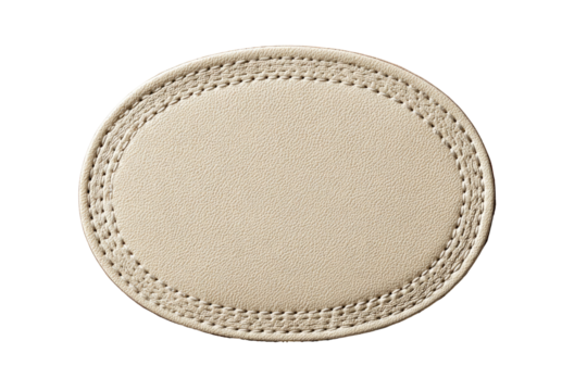 Cream-colored oval leather coaster, stitched border