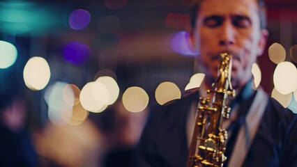 Obraz premium Man playing the saxophone. A male musician plays a saxophone. Jazz musician performs at a nightclub. A man performing on the saxophone lifestyle.