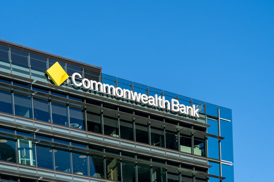 Sydney, New South Wales, Australia - August 12, 2025: Commonwealth Bank logo and sign on the office building in Sydney, Australia. 