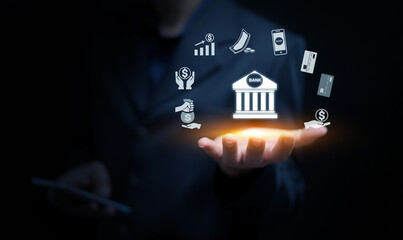 Businessman holding digital banking icons with mobile payment, credit card, investment, money transfer, and financial technology concept for modern online finance and innovation.