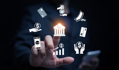 Businessman using digital banking technology with finance icons, mobile payment, credit card, online transaction, and money management in modern financial services.