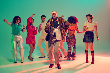 Man in fur coat leading disco dance floor with energy. Concept of individuality, confidence, retro glamour, nightlife performance and cultural expression.